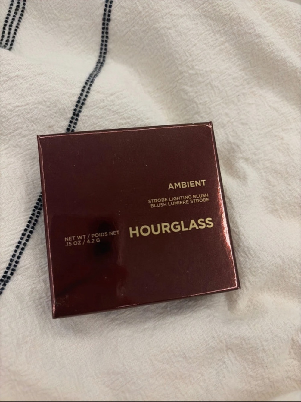Hourglass incandescent Electra ambient strobing light blush